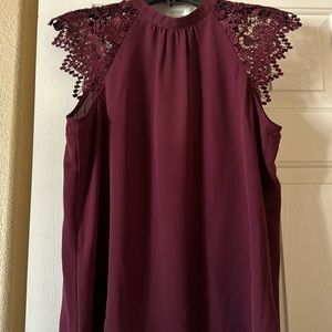 NWT Express wine top, lace sleeves, cut out back. Size medium.